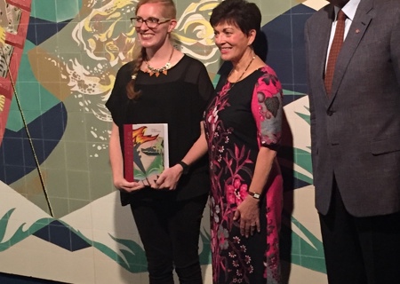<p>Author Bronwyn Holloway-Smith and Governor-General Dame Patsy Reddy standing in front of the E. Mervyn Taylor mural <em>Te Ika-a-Maui</em> at the launch of the book.</p>